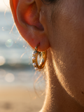 Argollas con perlas distribuidas