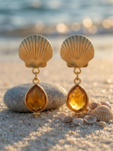 Aros concha con ágata teñida en la playa al atardecer | Buono Joyas