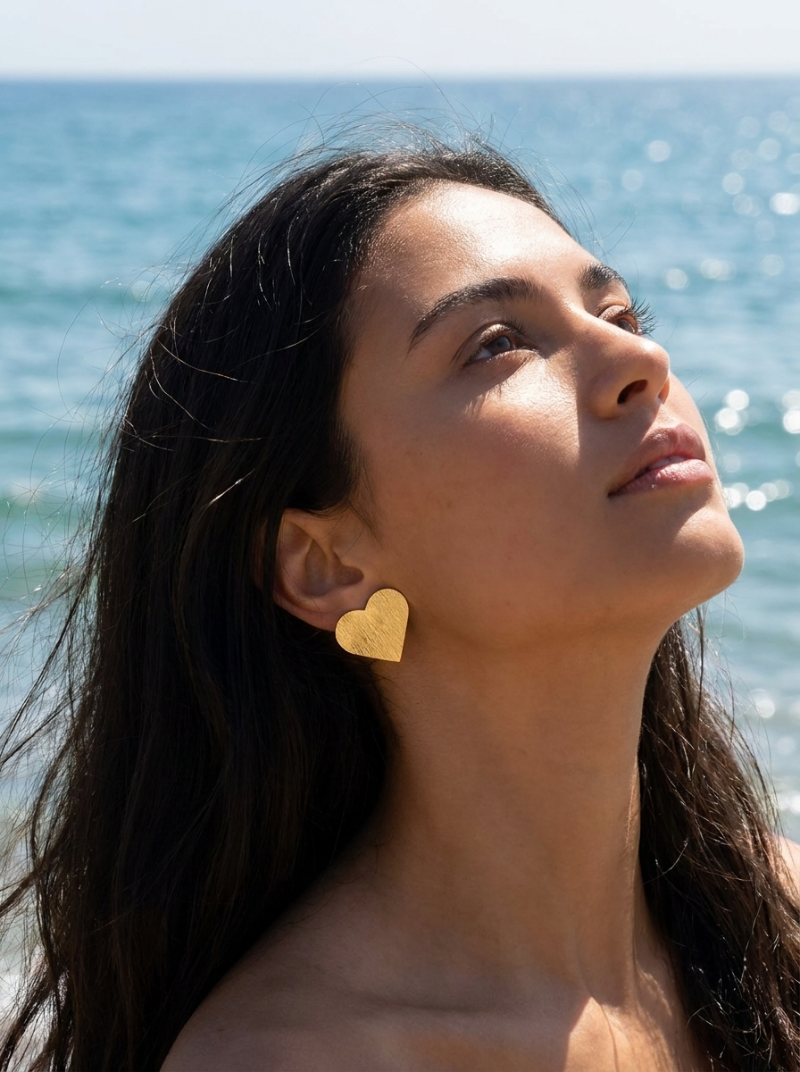 Aretes tipo botón con forma de corazón