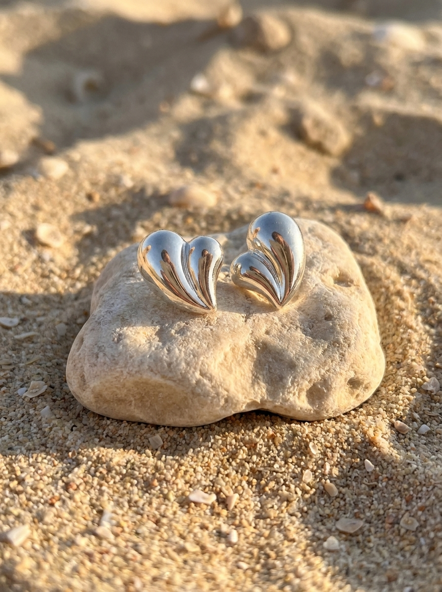 Aros Corazón Escultural Plateado