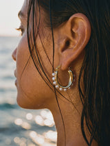 argollas-con-perlas video playa Buono