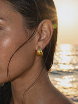 aros-gota-oro-y-plata video playa Buono