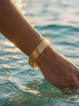 pulsera-tejido-plano-dorado video playa Buono