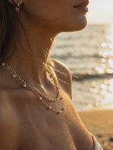 collar-doble-con-perlas-de-rio video playa Buono